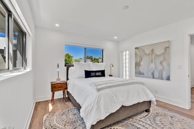 bedroom featuring wood-type flooring