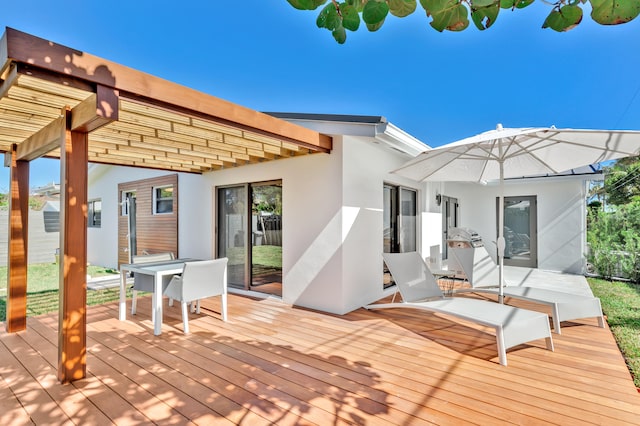 wooden deck with a pergola