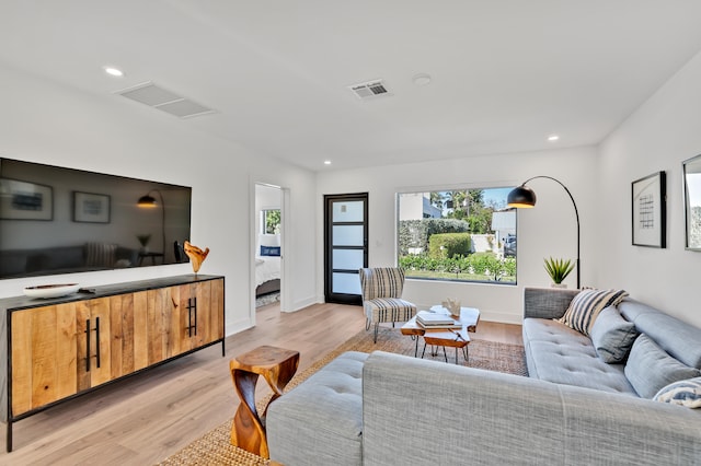 living room featuring light wood-type flooring