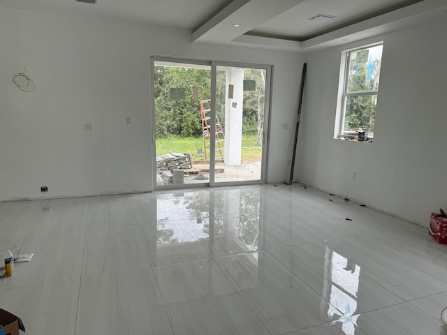 view of tiled spare room