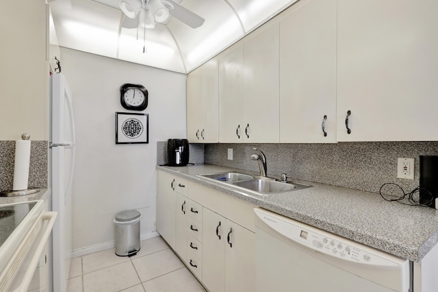 kitchen featuring backsplash, white appliances, light tile patterned floors, ceiling fan, and sink