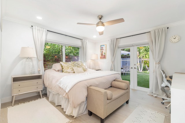 bedroom with ceiling fan, access to exterior, ornamental molding, and french doors