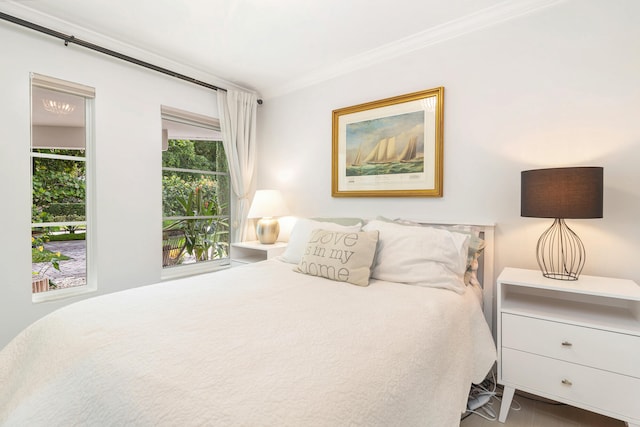 bedroom featuring crown molding