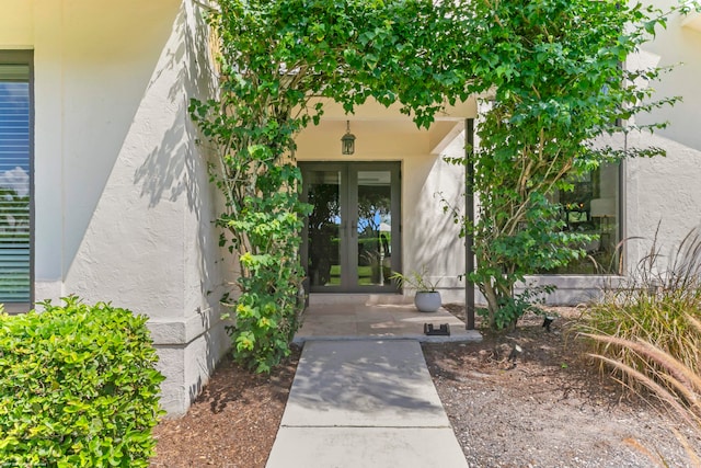 entrance to property featuring french doors