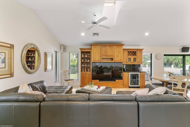 living room with vaulted ceiling, beverage cooler, and ceiling fan