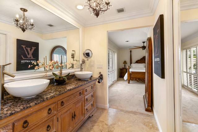 corridor with ornamental molding, an inviting chandelier, and sink