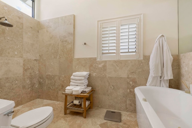 bathroom with a bath, tile walls, and vaulted ceiling