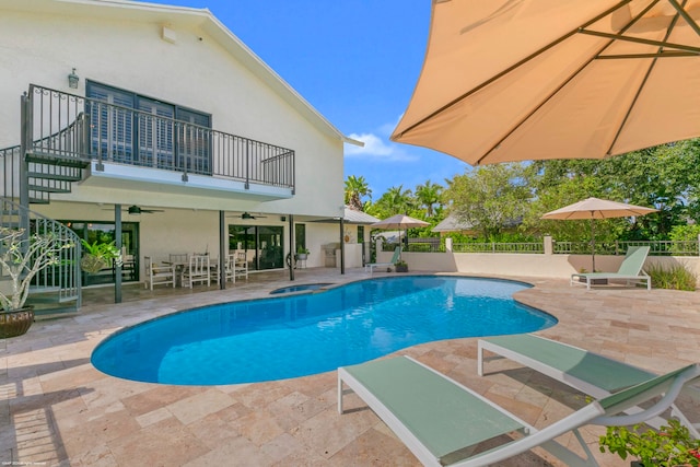 view of swimming pool featuring a patio