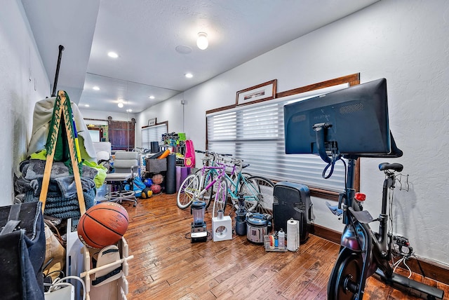 miscellaneous room with hardwood / wood-style floors