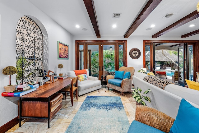 living room with french doors and beam ceiling