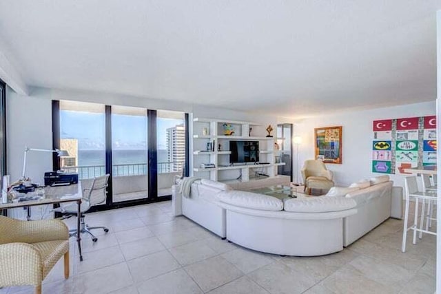 living room with light tile patterned floors