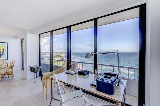 dining area featuring a water view