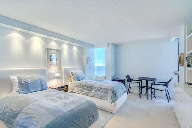 bedroom featuring a textured ceiling