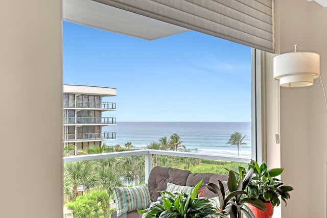 balcony featuring a water view