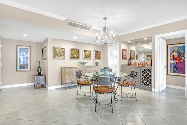 dining space with crown molding, light tile patterned floors, and a chandelier