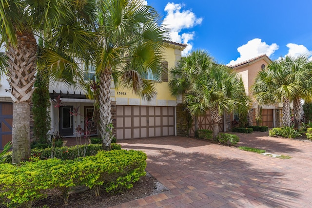 view of front of property with a garage