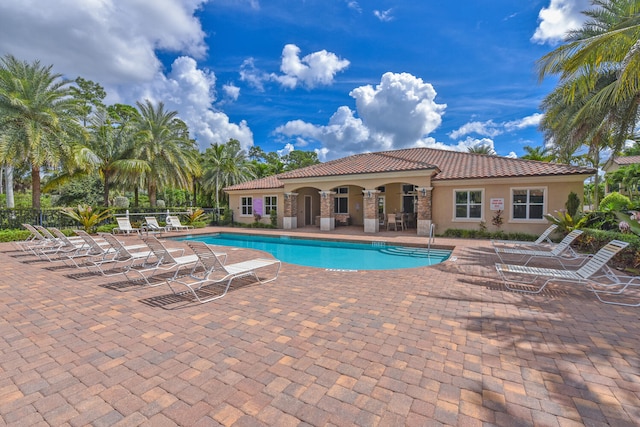 view of pool featuring a patio area