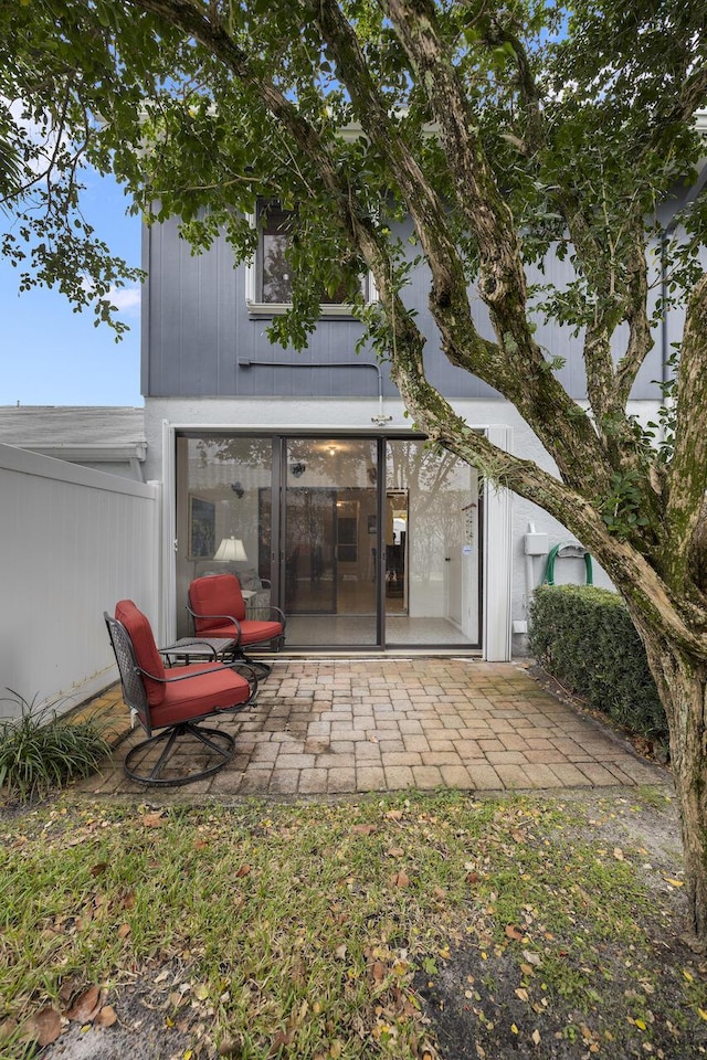 rear view of house featuring a patio area