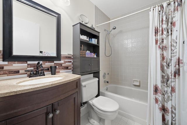 full bathroom with shower / bath combo, vanity, and toilet