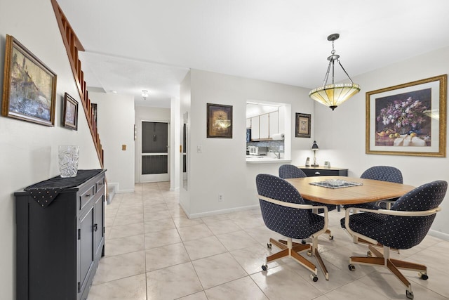 dining room with light tile patterned floors