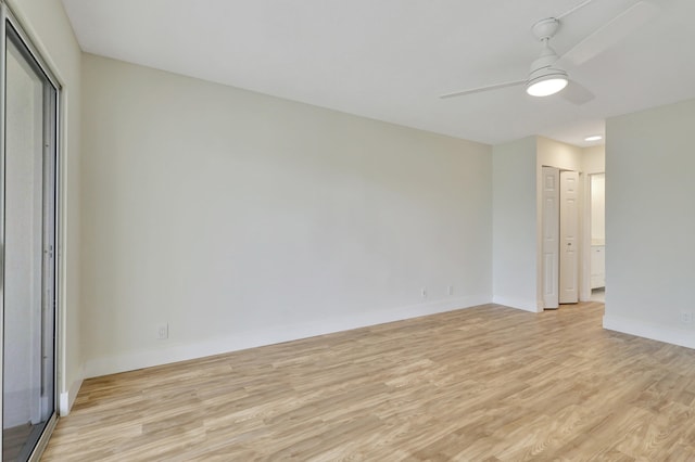 unfurnished bedroom featuring light wood-type flooring and ceiling fan