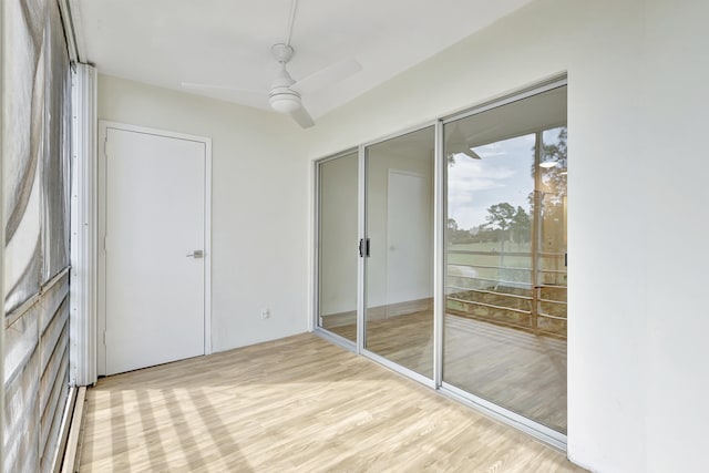 unfurnished bedroom with light hardwood / wood-style floors and ceiling fan