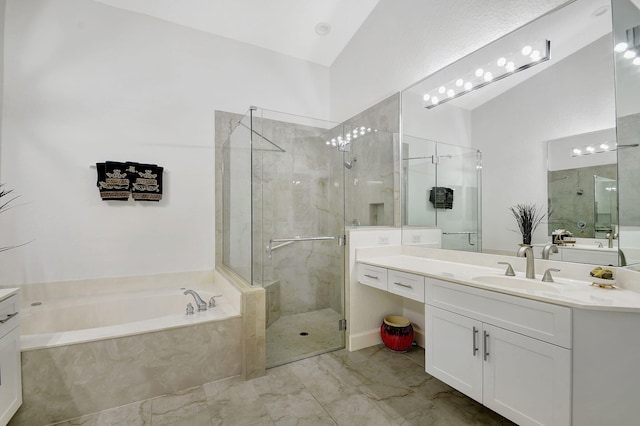 bathroom featuring vanity, plus walk in shower, and vaulted ceiling