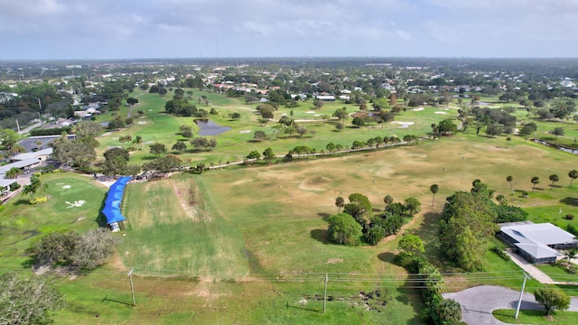 birds eye view of property with a rural view