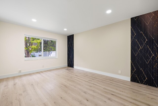 empty room featuring light hardwood / wood-style flooring