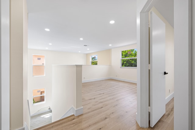 hallway featuring light hardwood / wood-style flooring