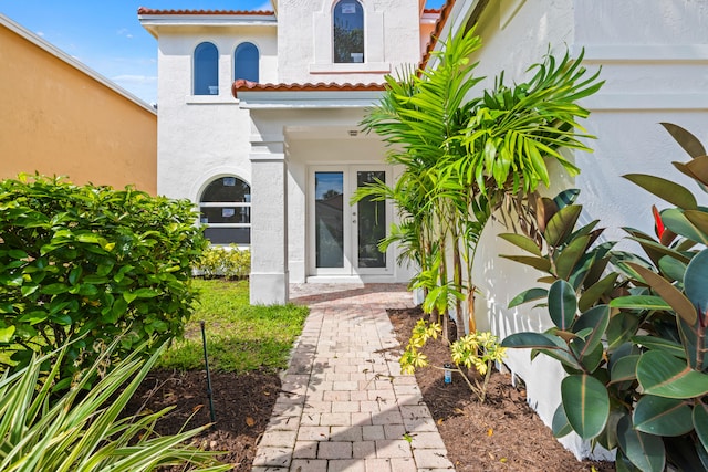 doorway to property featuring french doors