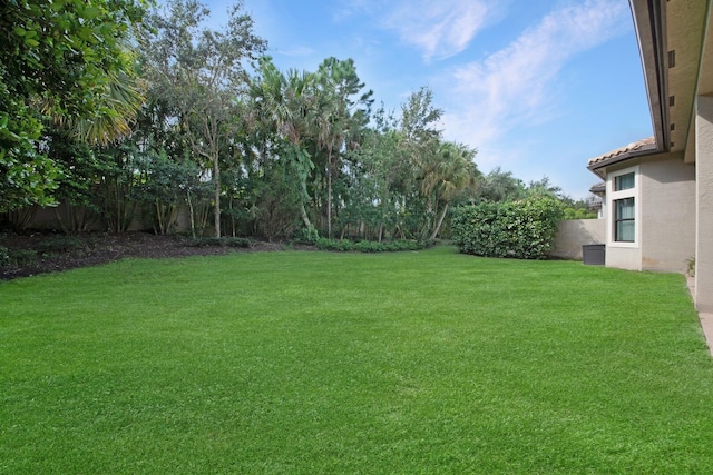view of yard with fence