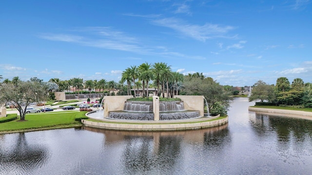 surrounding community with a water view