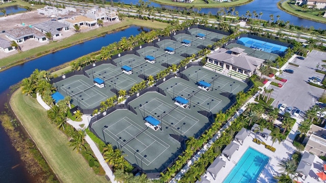 birds eye view of property featuring a water view
