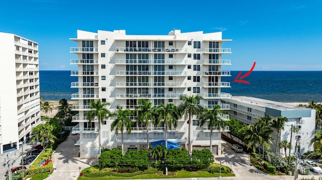 view of building exterior with a water view