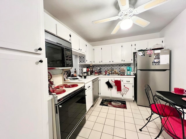 kitchen featuring sink, decorative backsplash, ceiling fan, appliances with stainless steel finishes, and white cabinetry