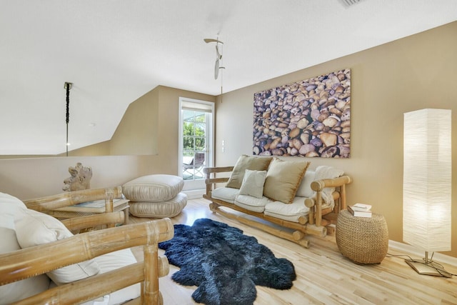 sitting room featuring hardwood / wood-style flooring