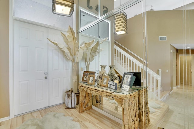 foyer with hardwood / wood-style floors