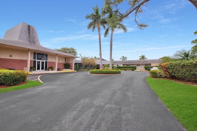2581 N Garden Dr Unit 306, Lake Worth, FL 33461 - view of asphalt driveway