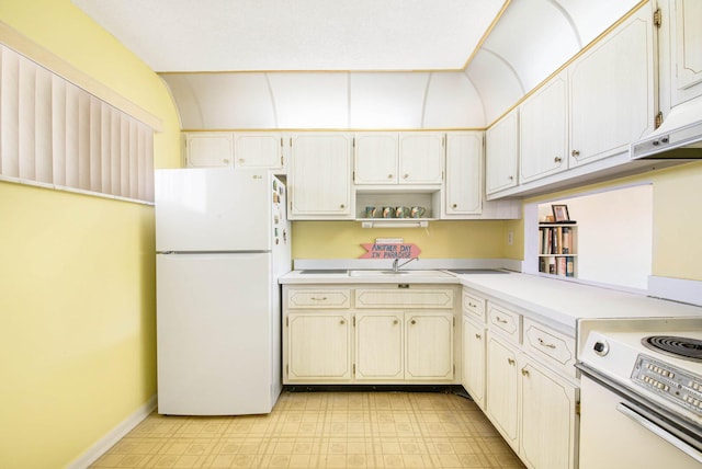 2581 N Garden Dr Unit 306, Lake Worth, FL 33461 - kitchen with freestanding refrigerator, light countertops, light flooring, a sink, and open shelves