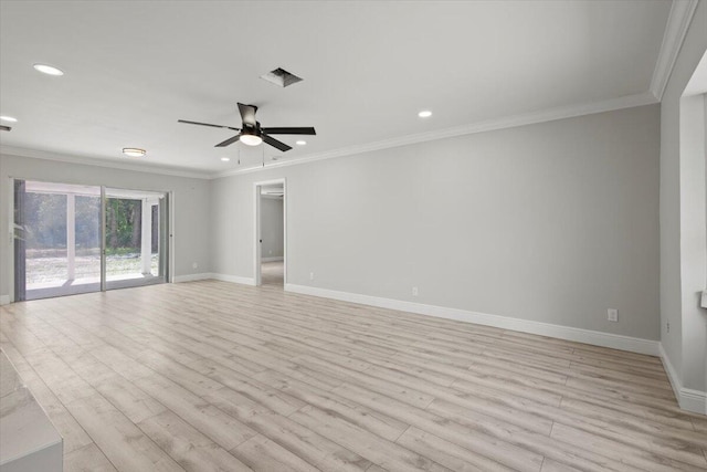 spare room featuring ceiling fan, light hardwood / wood-style floors, and crown molding