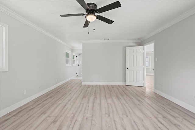 spare room with crown molding, light hardwood / wood-style flooring, ceiling fan, and a textured ceiling