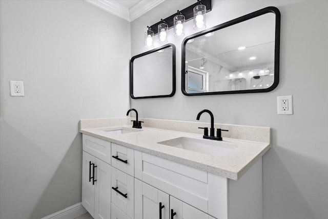 bathroom with vanity and ornamental molding