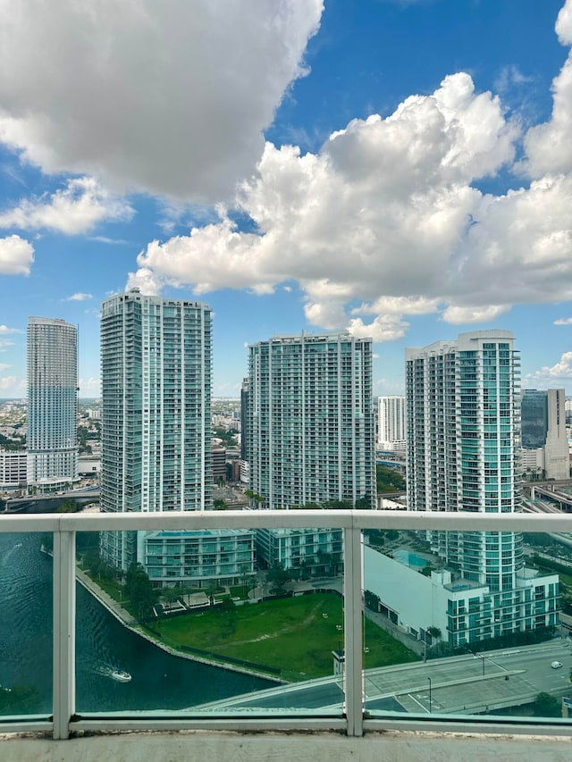 balcony featuring a water view