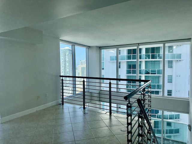 41 SE 5th St Unit 2017, Miami, FL 33131 - tiled empty room with baseboards and a city view