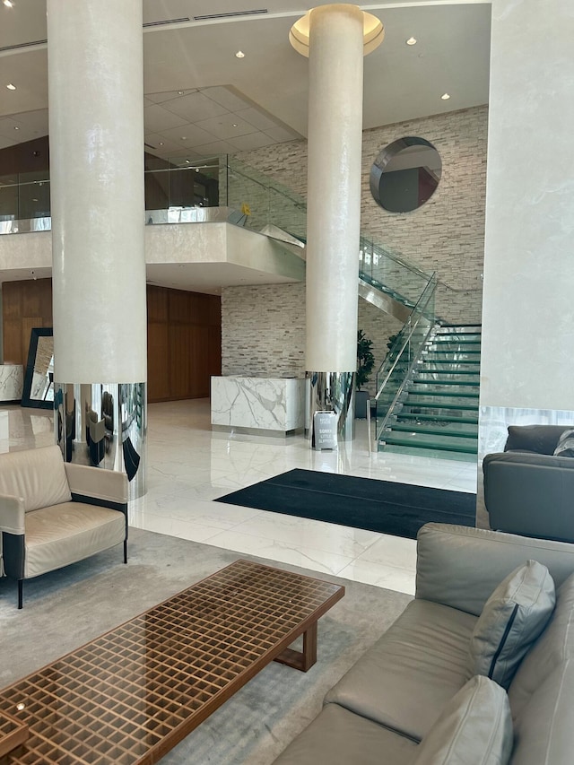 41 SE 5th St Unit 2017, Miami, FL 33131 - community lobby with a high ceiling, recessed lighting, and stairs