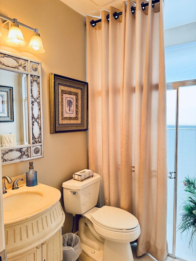 bathroom with vanity and toilet