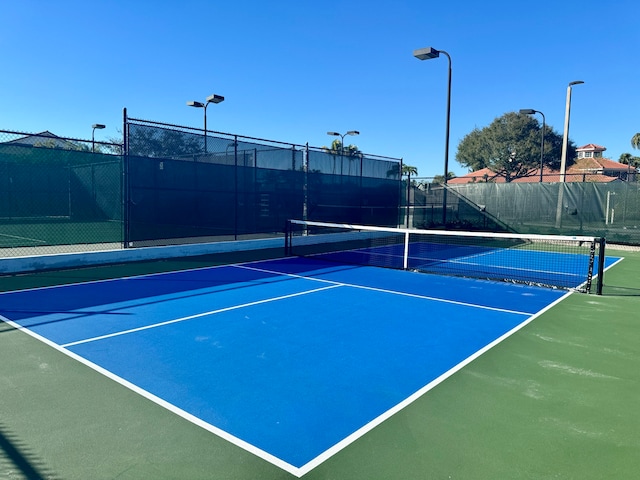 view of tennis court with basketball court