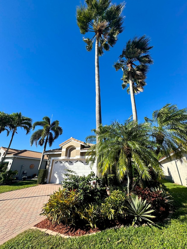 view of front of property with a garage