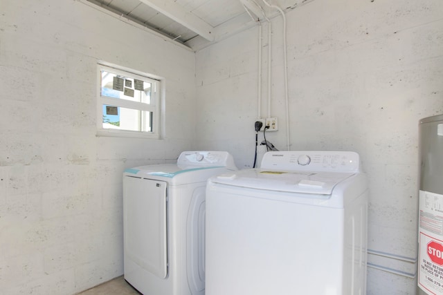 laundry room featuring independent washer and dryer and gas water heater